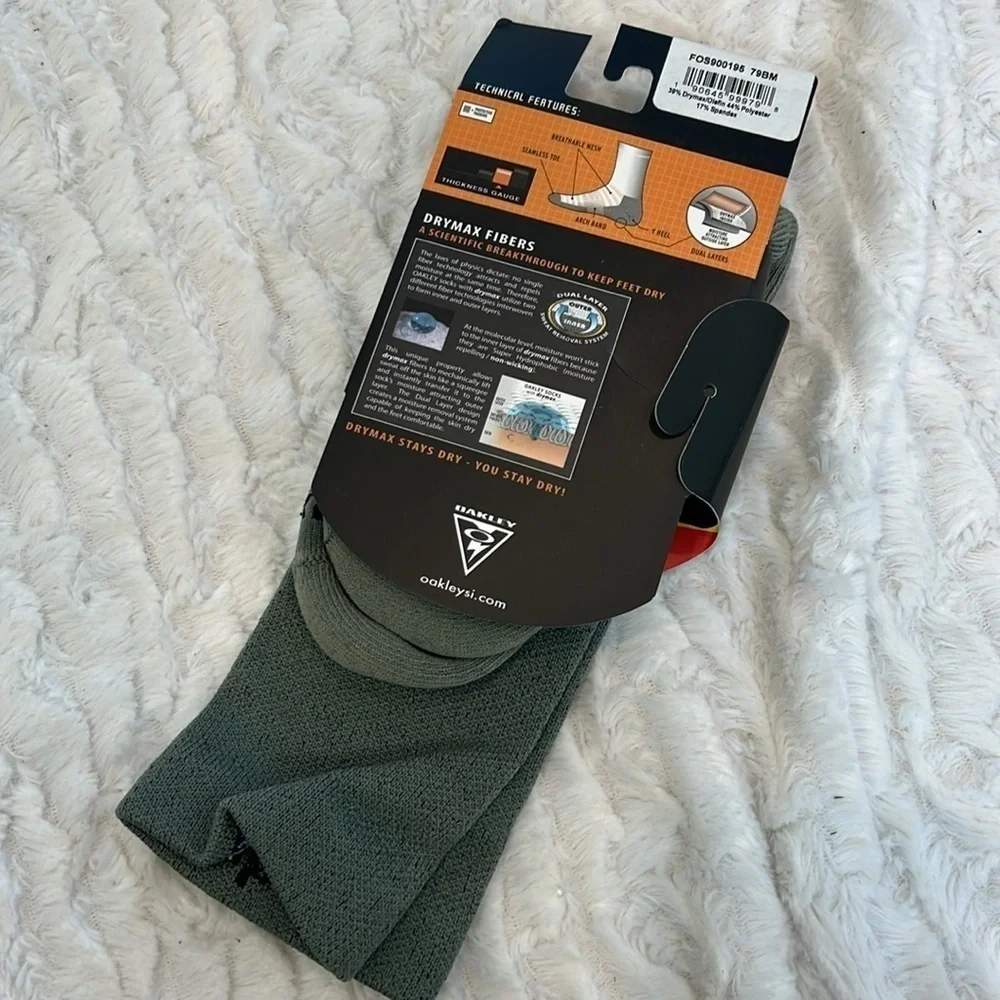 Brand new Oakley, tall crew, tactical socks, olive women 7.5–9.5 men’s 6–8